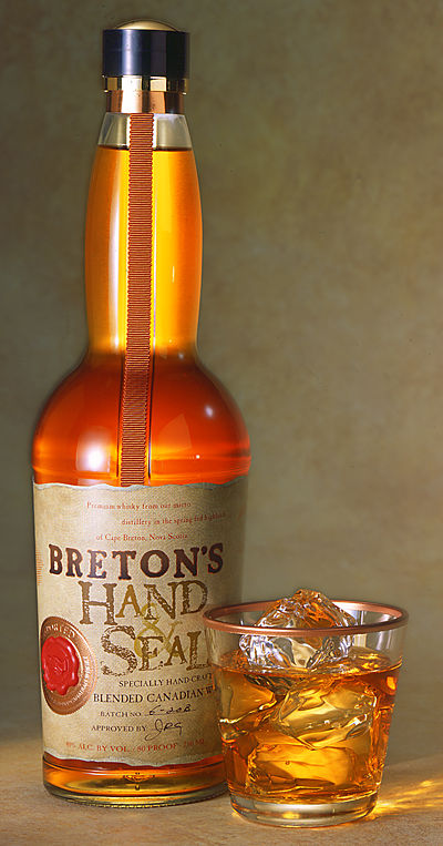 Whiskey bottle and glass